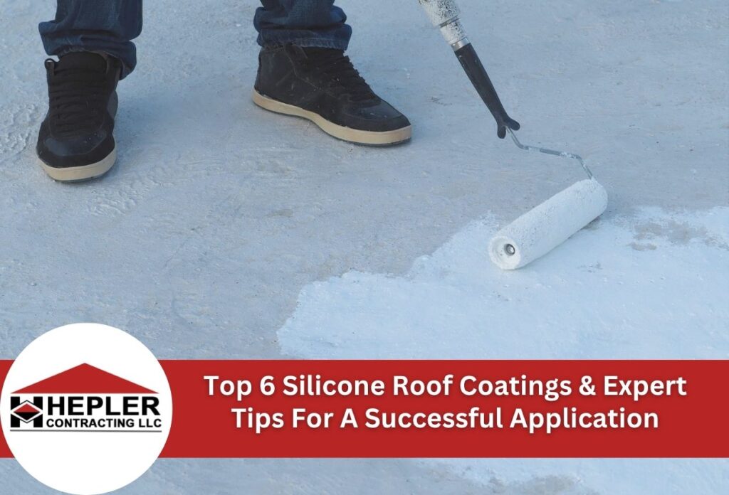 Person applying silicone roof coating with paint roller on concrete surface