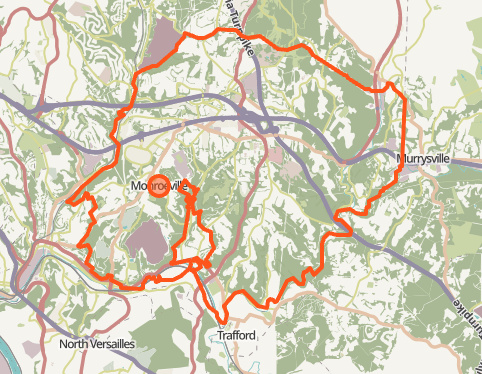 Topographical map showing cycling route around Versailles with orange path marking